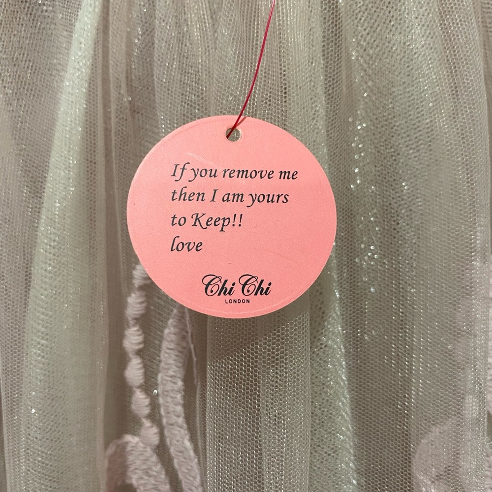 NWT!! Gorgeous yea length rose colored dress.